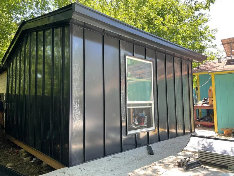 Black standing seam metal wall panels for Roof Inspection in Bon Air